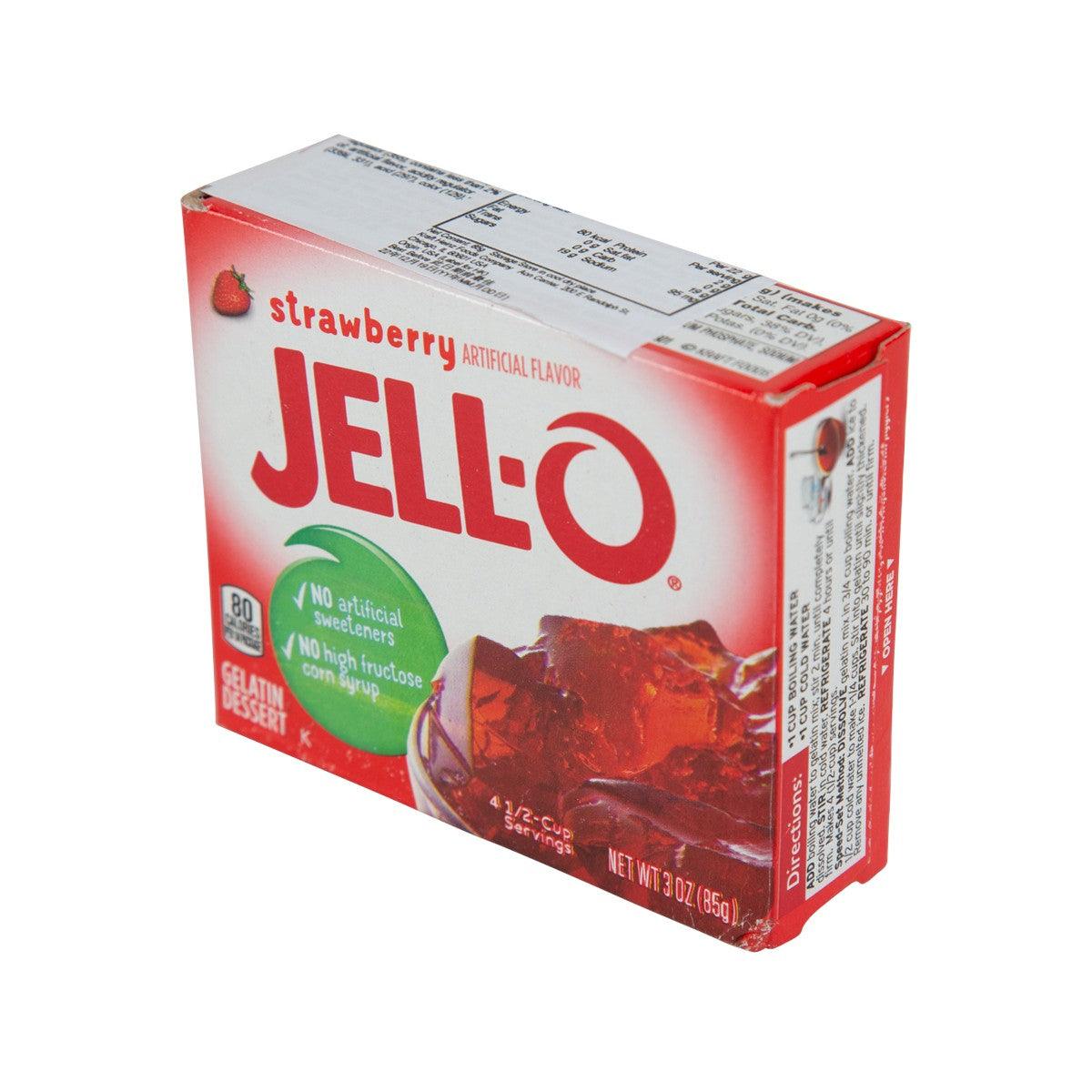 JELL-O Strawberry gelatin dessert mix box side view with red top and white panels