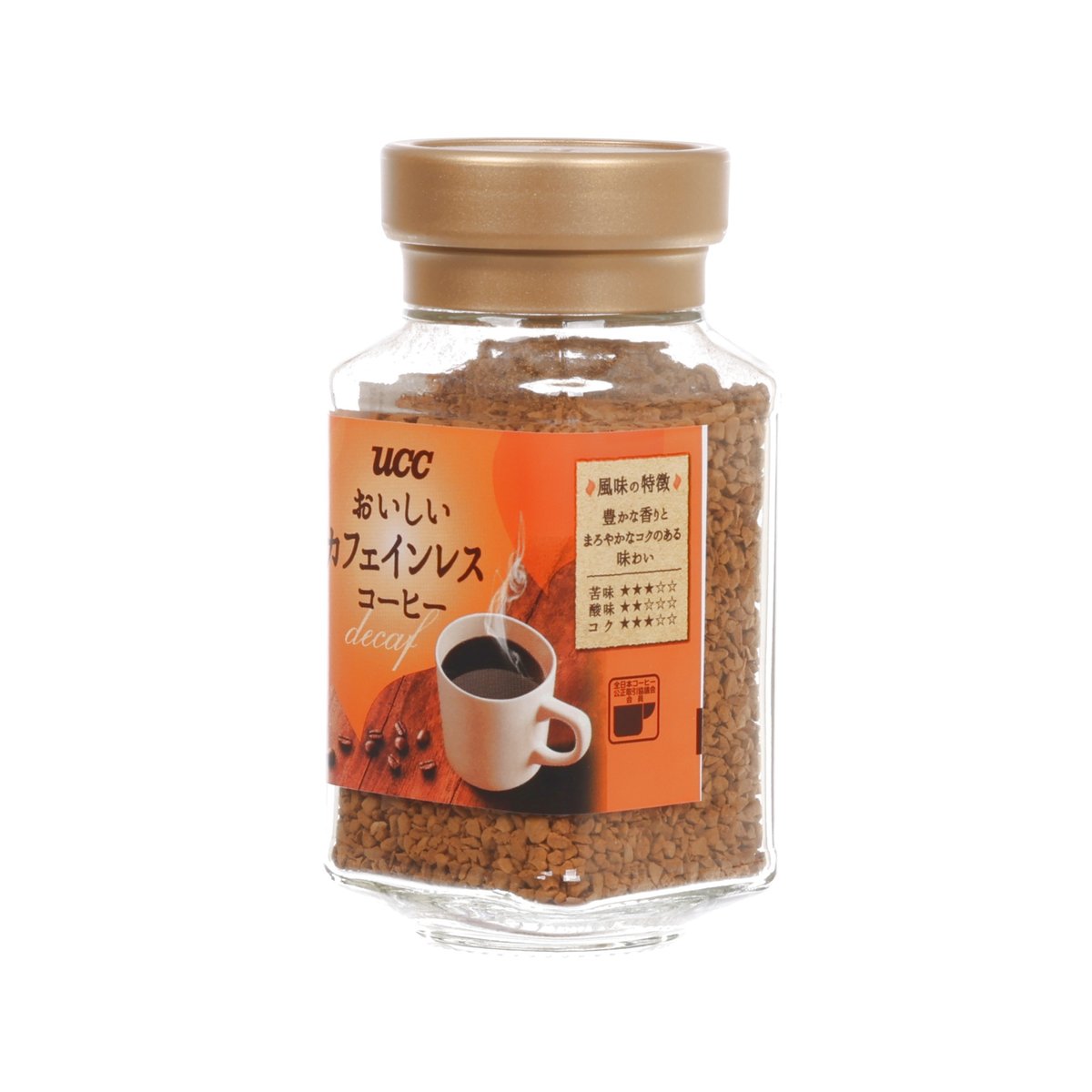 UCC decaffeinated instant coffee jar showing side label and coffee granules in container