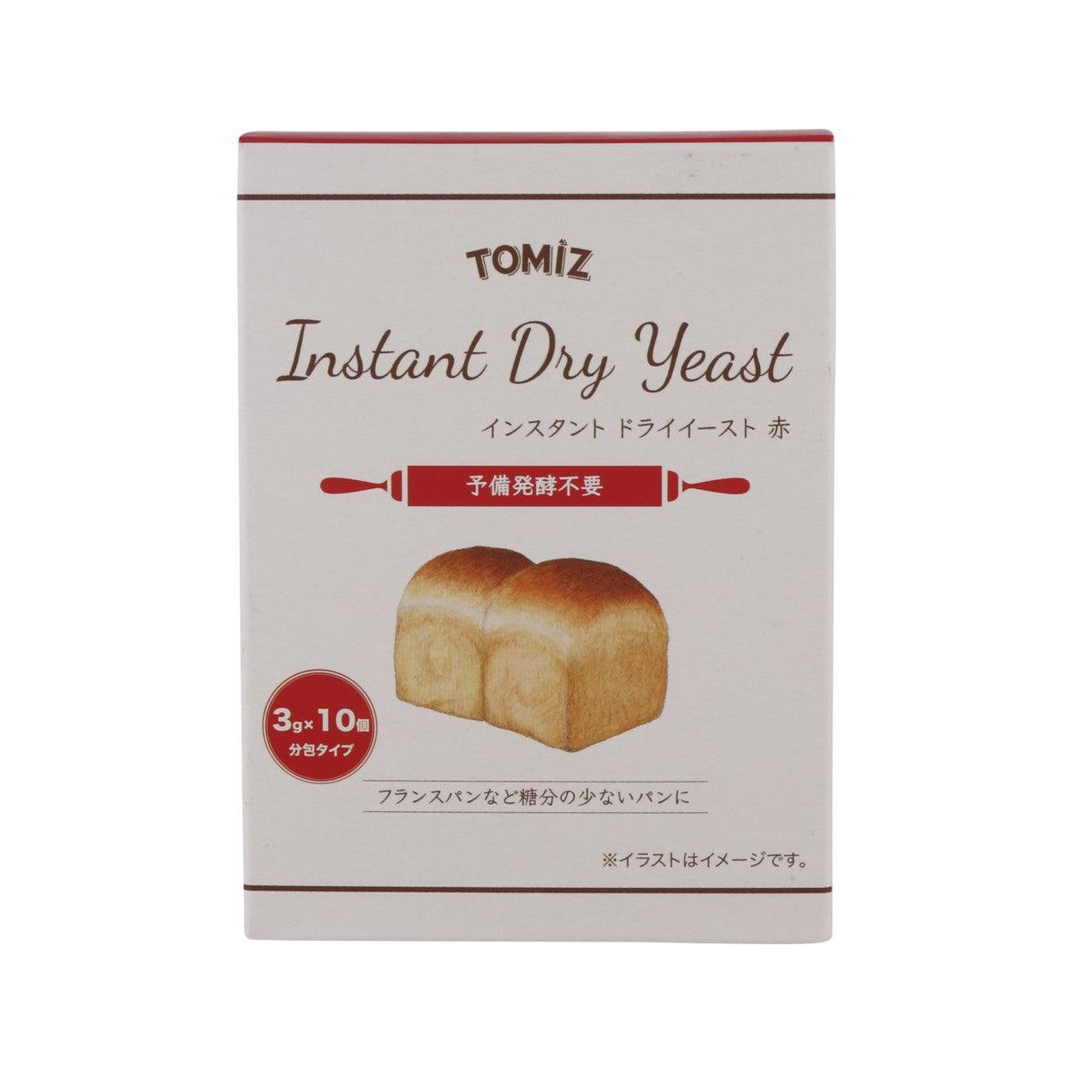 Instant dry yeast carton with TOMIZ Instant Dry Yeast branding and red accents
