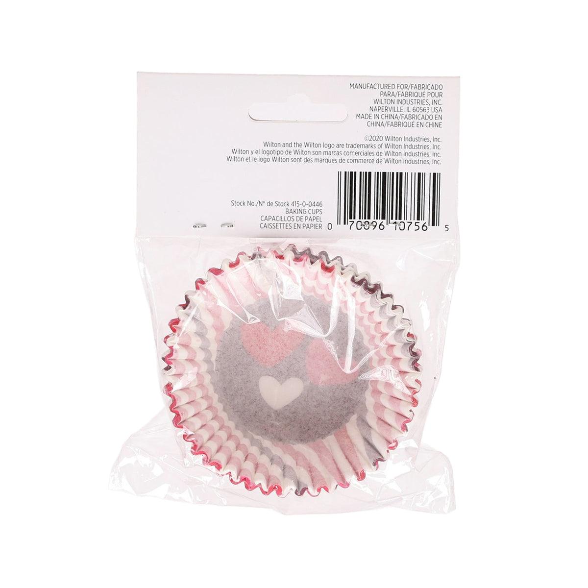 WILTON Valentine baking cups in clear bag, heart pattern visible with barcode