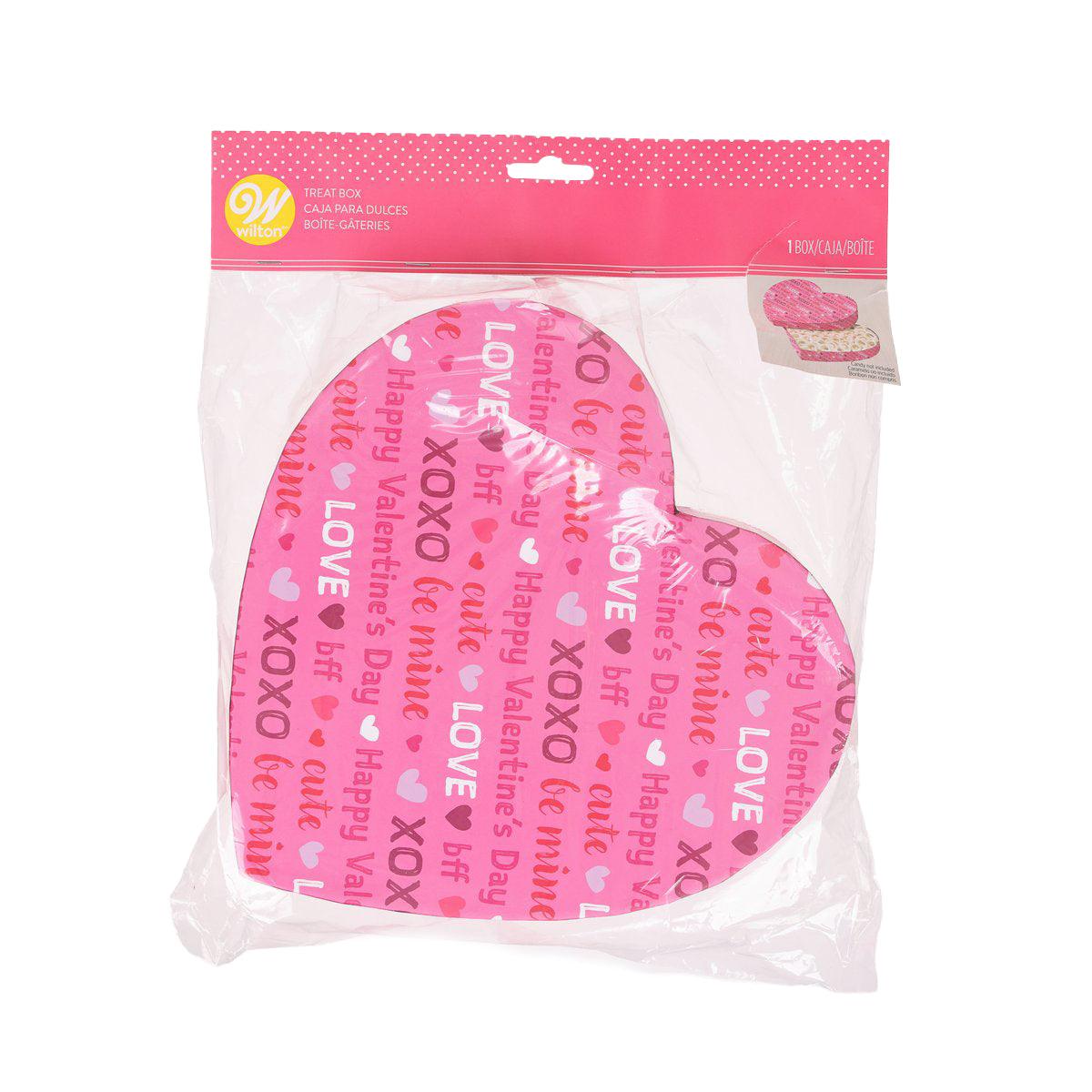 Heart-shaped Valentine treat box in pink with XOXO and LOVE text pattern