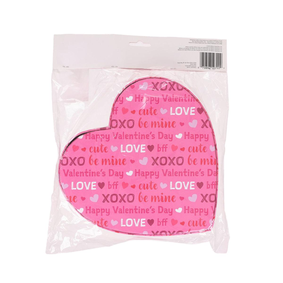 Heart-shaped Valentine treat box in pink with LOVE and heart pattern, packaged