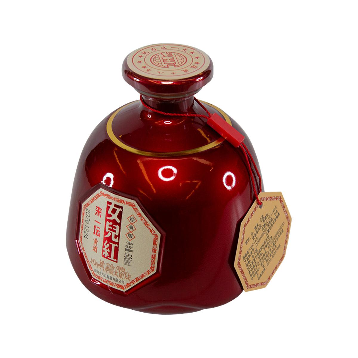 Red liquor bottle with side label and round cap, glossy glass with foil seals