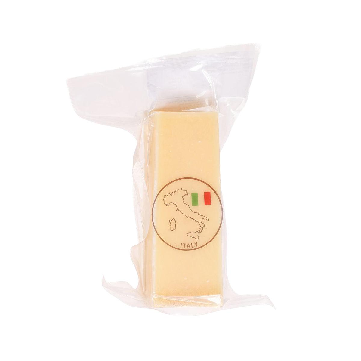 Italian vegetarian parmesan cheese block in sealed plastic pack