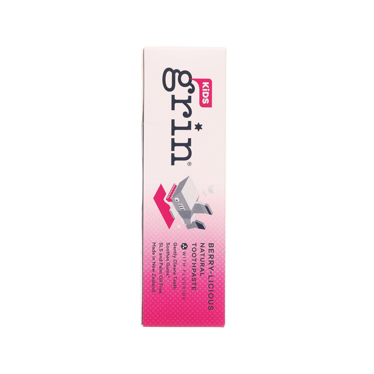 GRIN kids fluoride toothpaste box side, pink dotted graphics and ingredient text