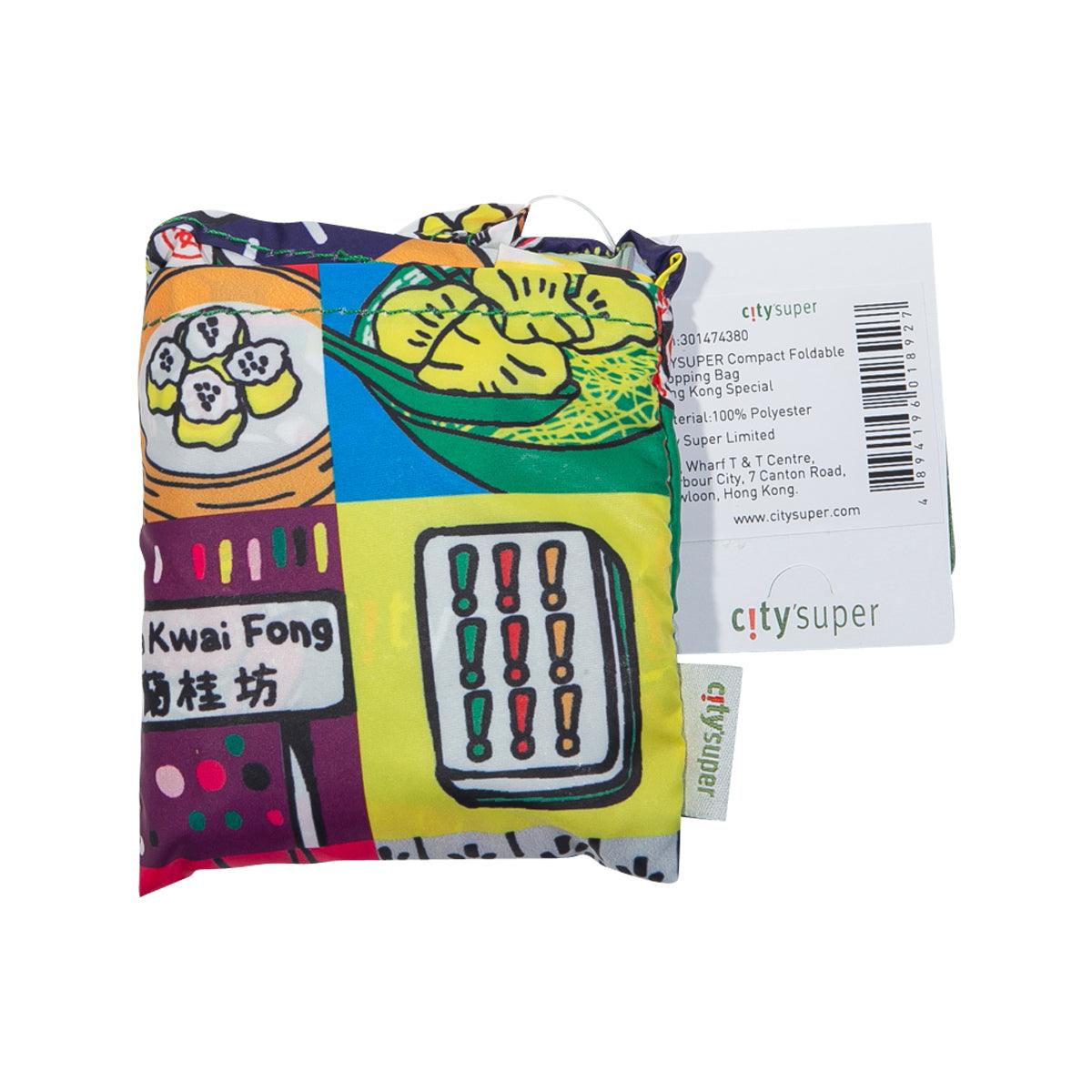 Compact foldable shopping bag, folded with barcode tag and colorful artwork