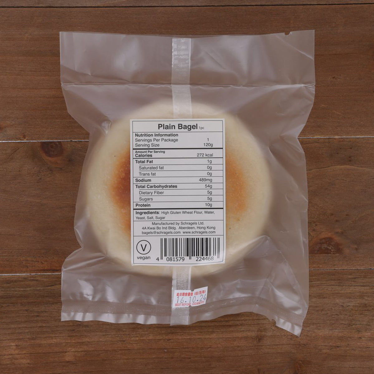 Wrapped plain bagel showing nutrition information panel and barcode