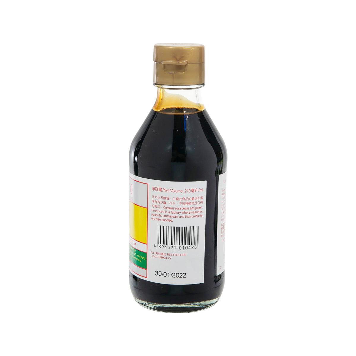 Premium soy sauce bottle with gold cap, back label with barcode