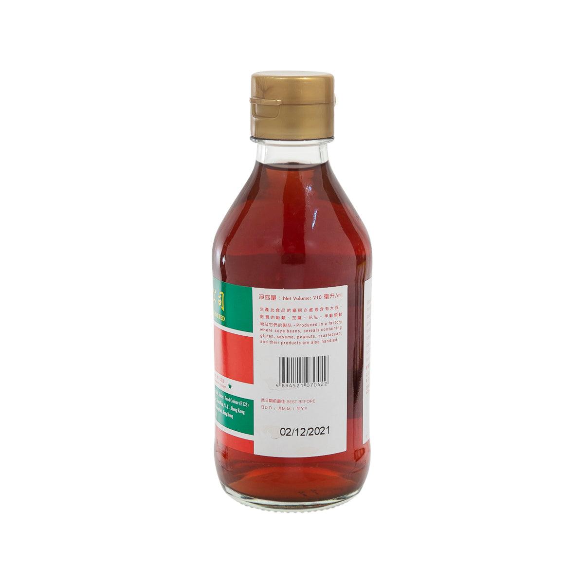 Red vinegar bottle with gold cap, back label and barcode