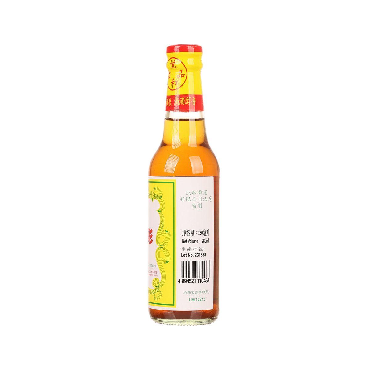 Chinese wine bottle with red cap and yellow back label