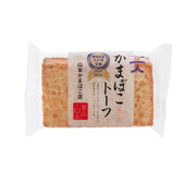 Wrapped tofu-style kamaboko fish cake, rectangular brown slices with front label
