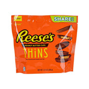 Reese's Thins bag in orange, milk chocolate & peanut butter cups, 208 g.