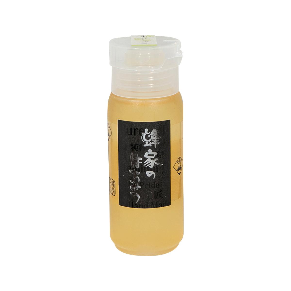 BEEMONTE Japanese acacia honey bottle, clear plastic with pump cap and front label