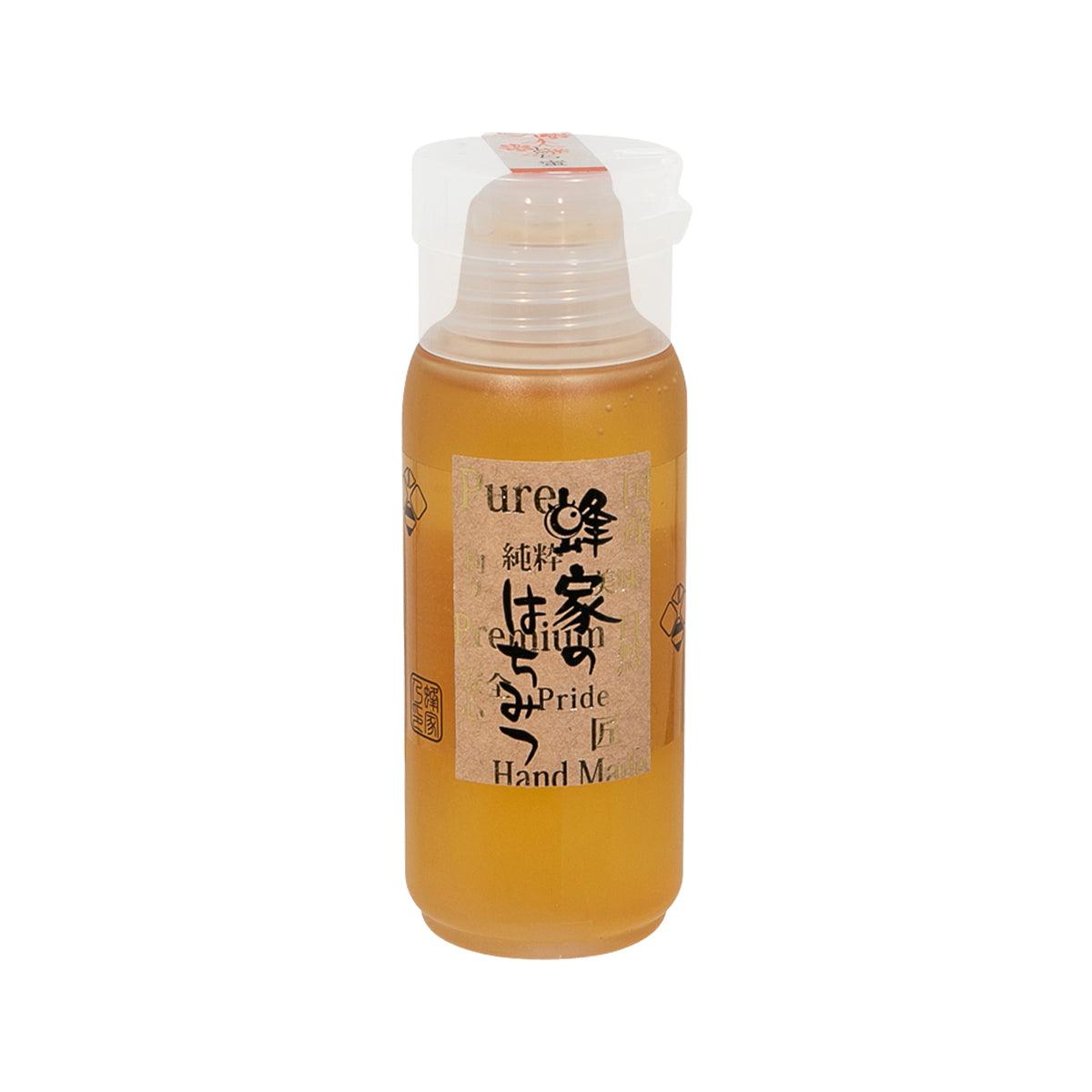 BEEMONTE Japanese honey in amber plastic bottle with white cap and honey label
