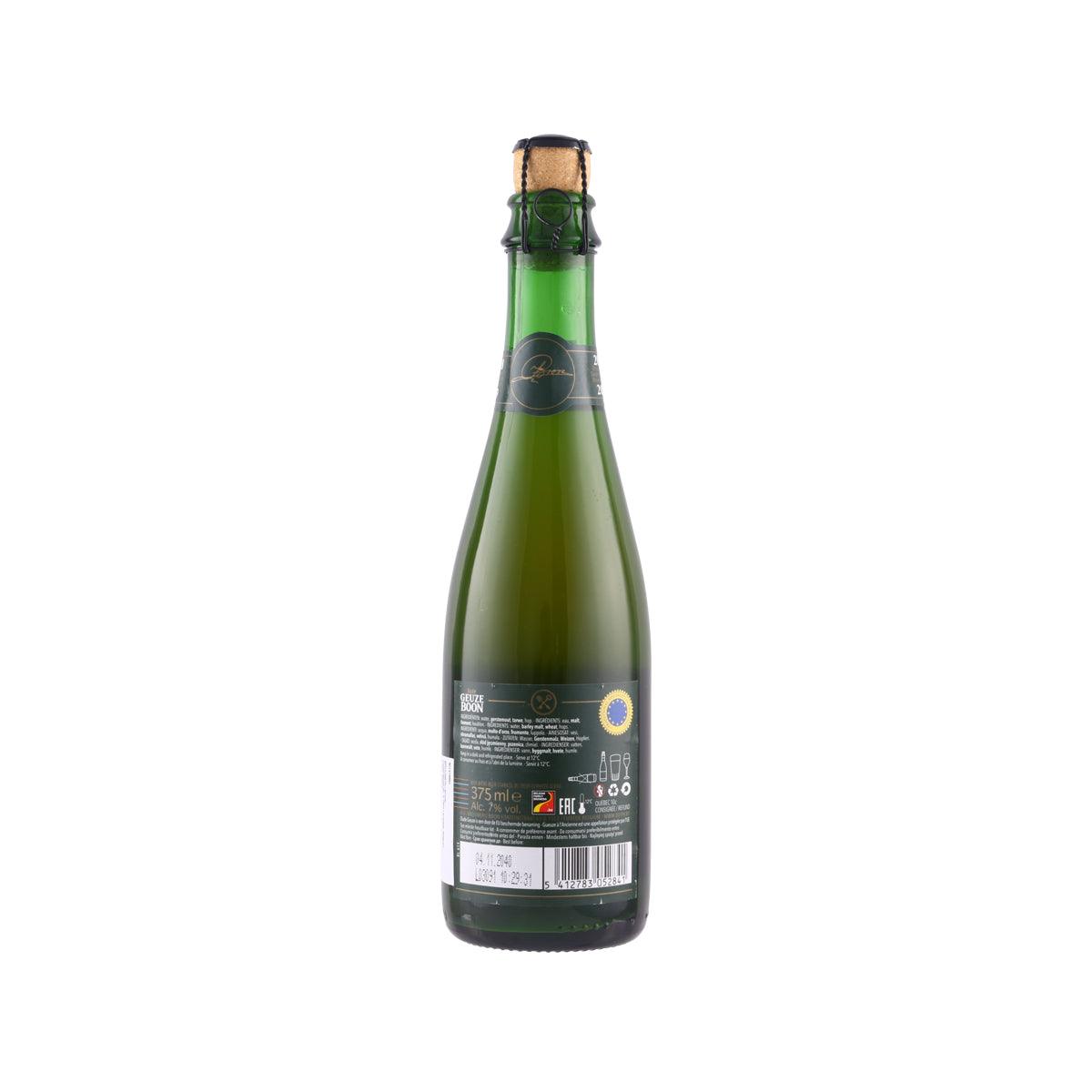 Green glass geuze beer bottle with back label and barcode