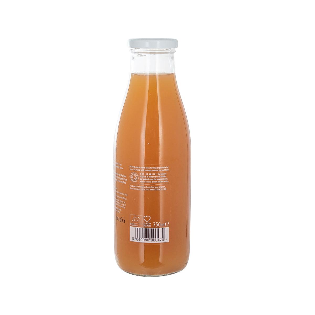 DAYLESFORD organic apple juice bottle, back label visible on orange juice, 750 mL