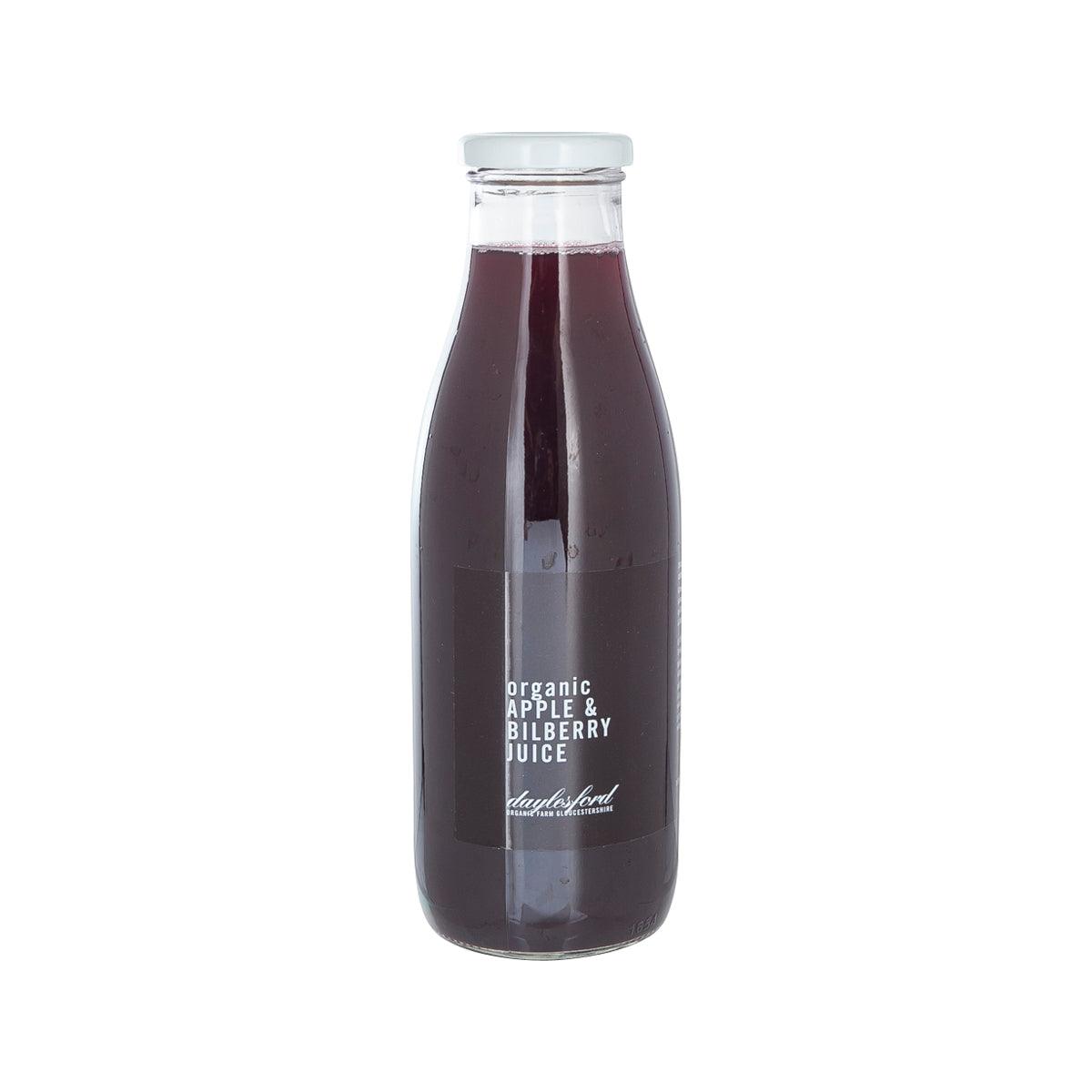 Daylesford Organic apple and bilberry juice bottle, 750 mL, dark purple liquid.