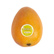 Baby mango, oval orange-yellow fruit with speckled skin and small brand sticker