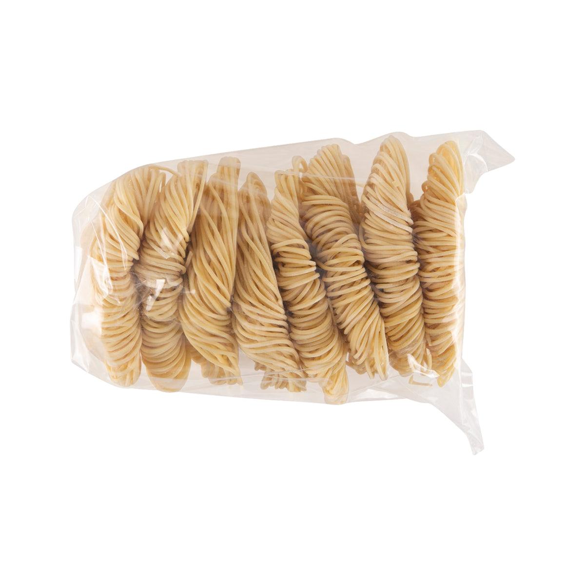 Bag of light yellow spiral noodles packaged for kids