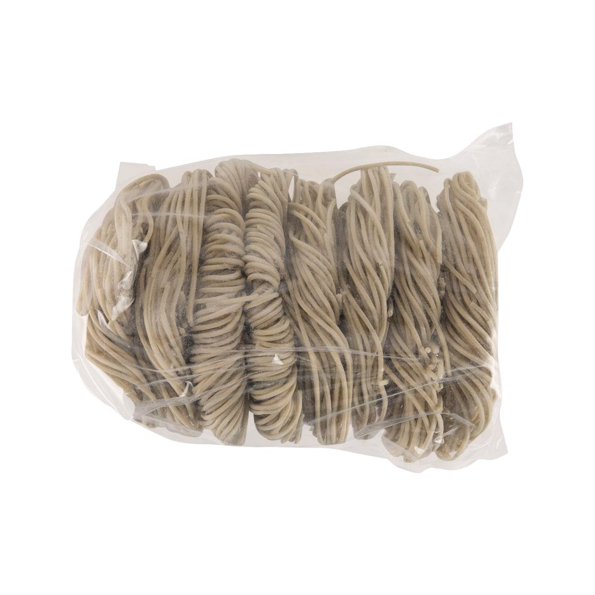 Vegetable kids noodles bundle in clear bag, light beige strands