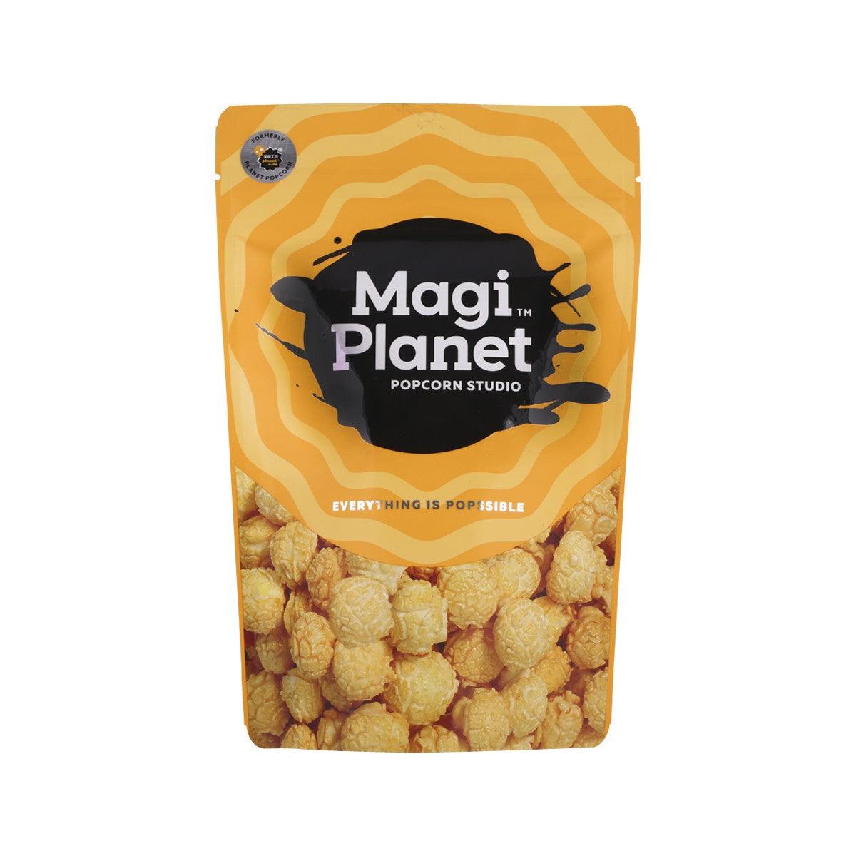 Orange popcorn bag with Magi Planet logo and cheese flavor popcorn pieces