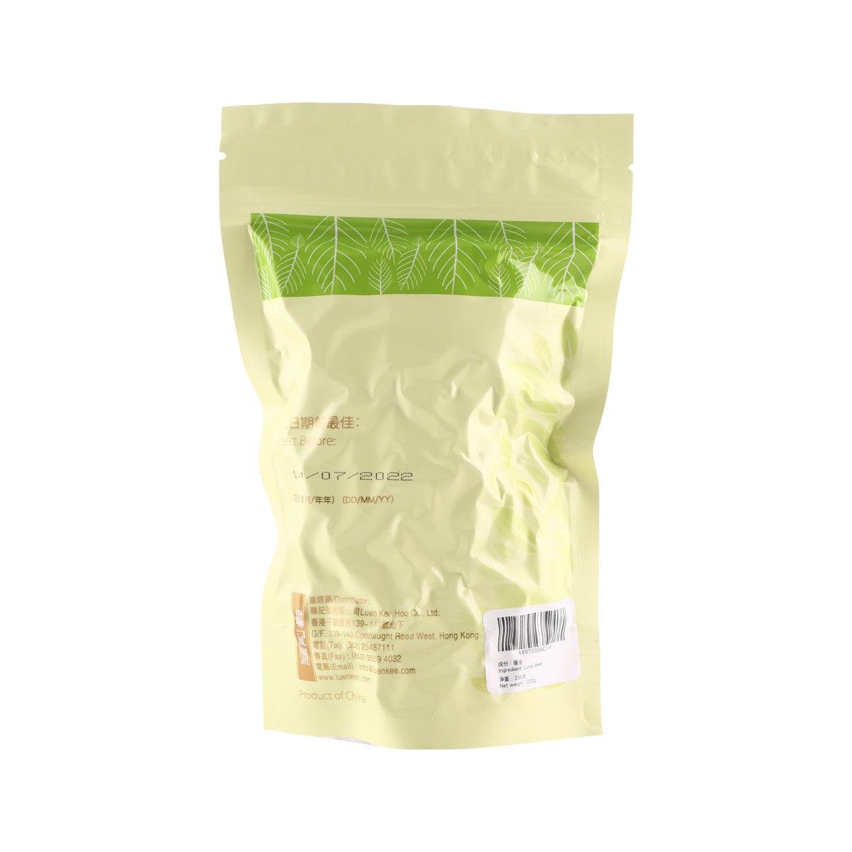 Back view of yellow pouch of dried lotus seeds with barcode