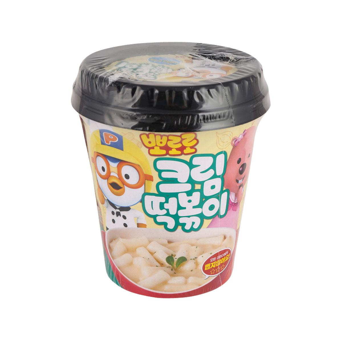Instant cream tteokbokki cup with black lid and illustrated character design