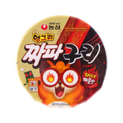 Spicy noodle cup with NONG SHIM Angry Chapaguri label and flame-eyed cartoon graphics