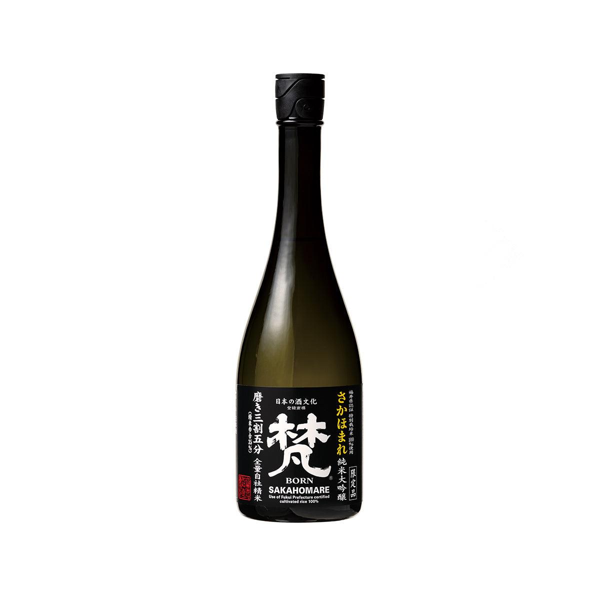 Dark glass sake bottle with black cap and gold label