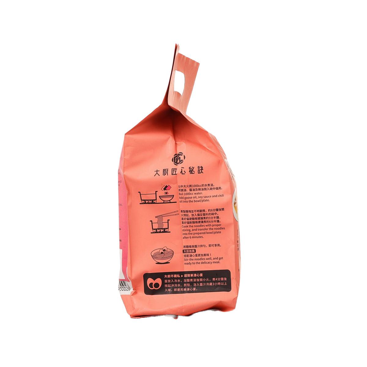 Orange-red noodles pouch with directions panel text and serving icons