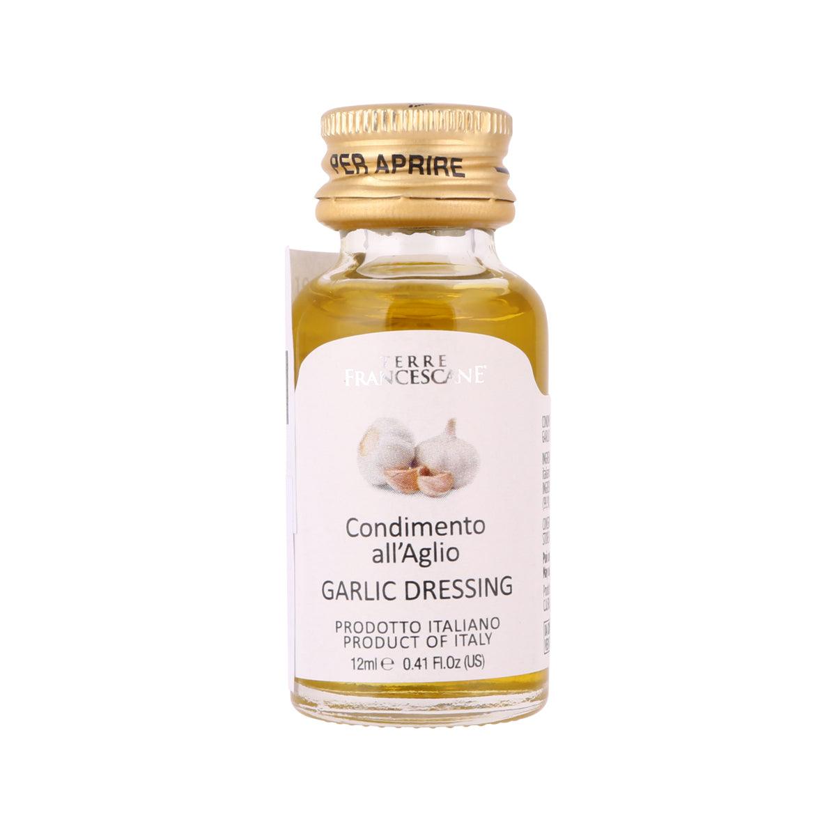 Garlic dressing bottle, small glass jar with gold cap and cream label