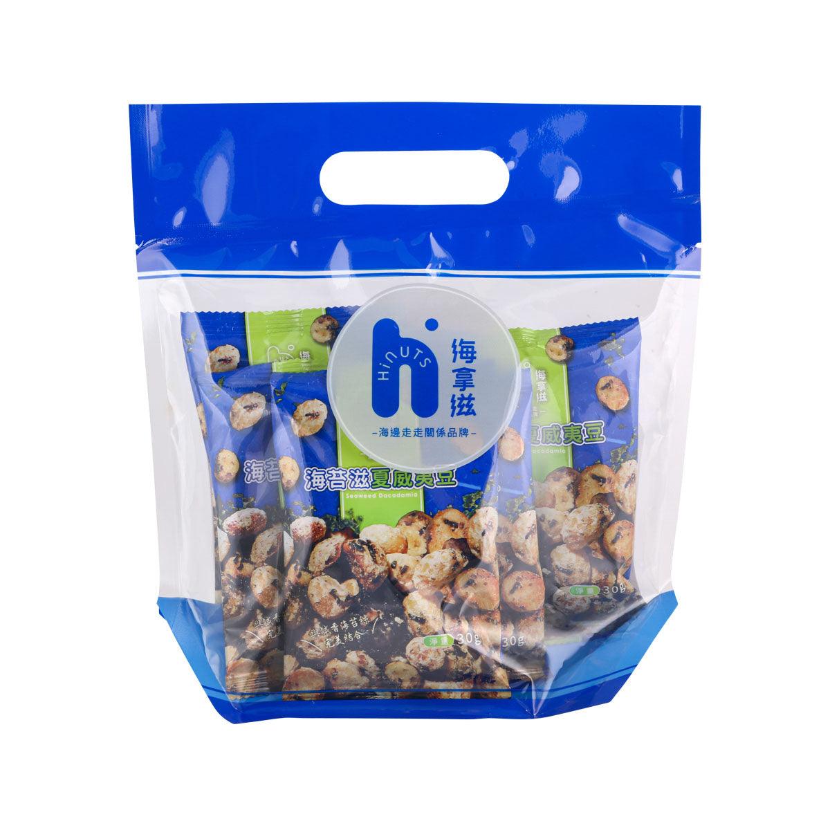 Seaweed macadamia snack bag with blue-and-white packaging and nut pieces inside