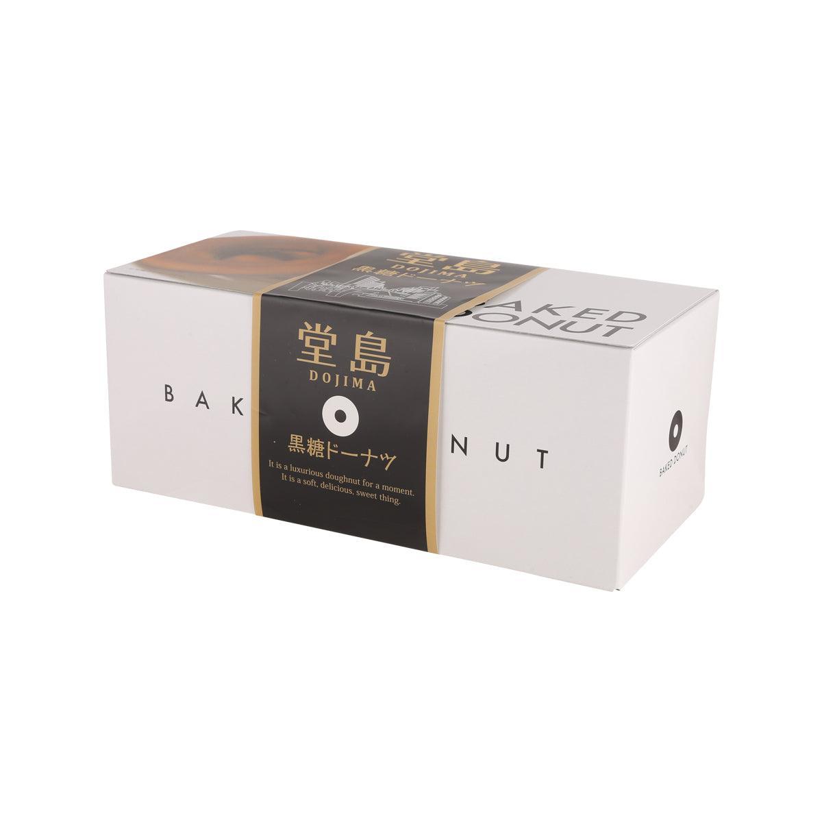 Baked donut box with 'BAKED' and 'NUT' panels, white and black packaging