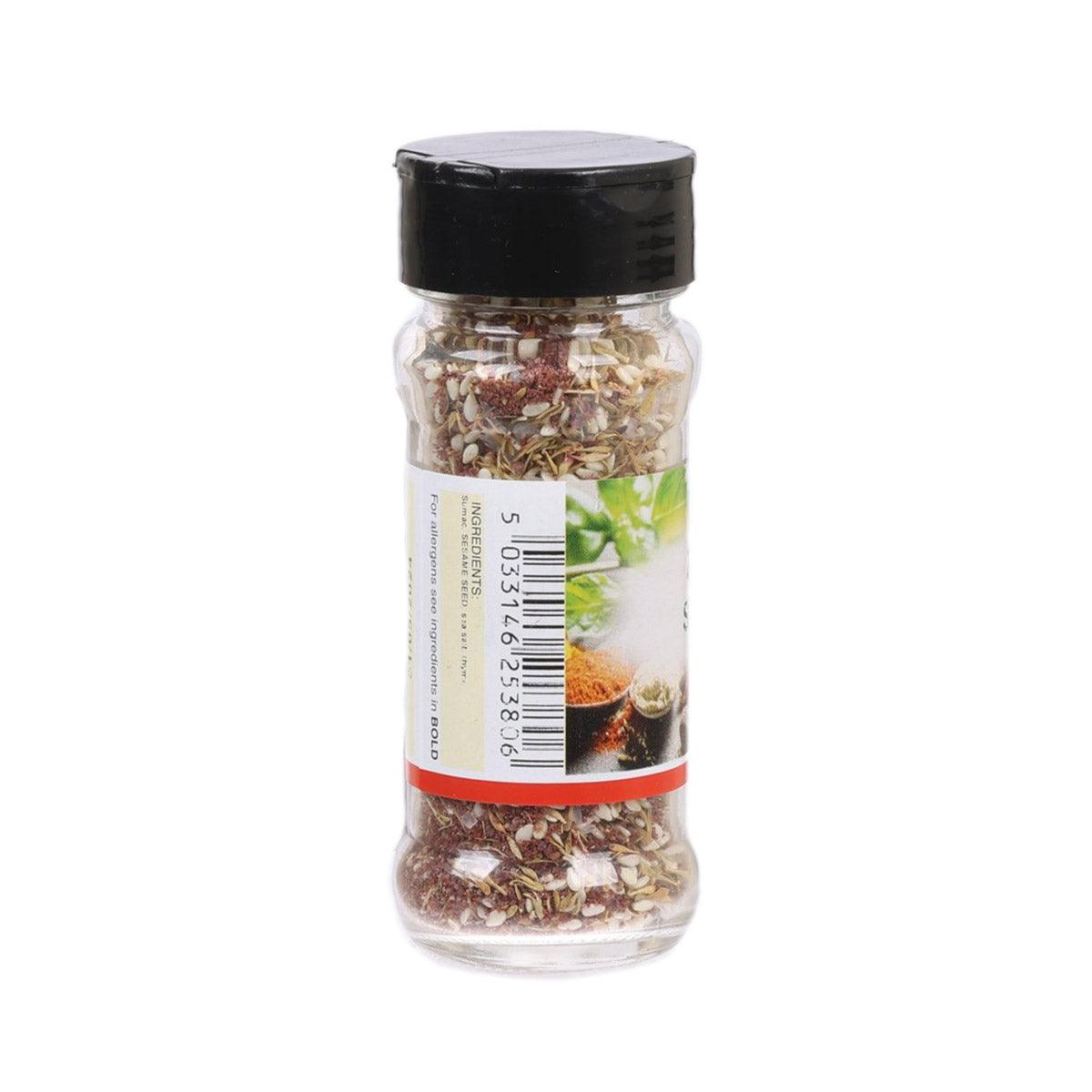 Za'atar spice mix bottle, clear jar with black lid and side barcode label