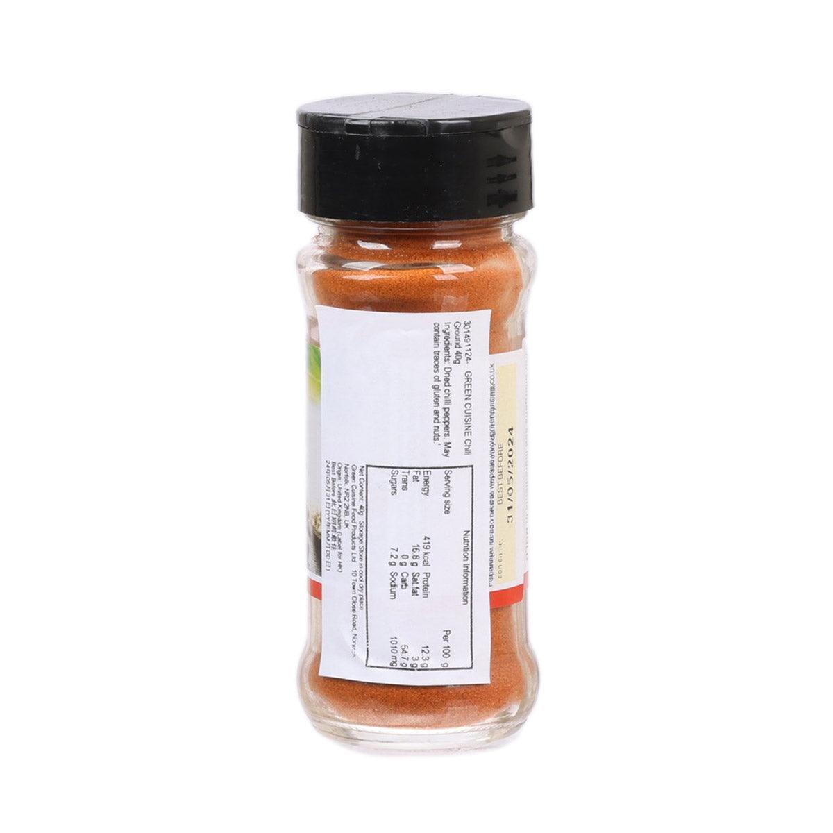 Green Cuisine chili powder bottle, back label view, black cap, orange spice