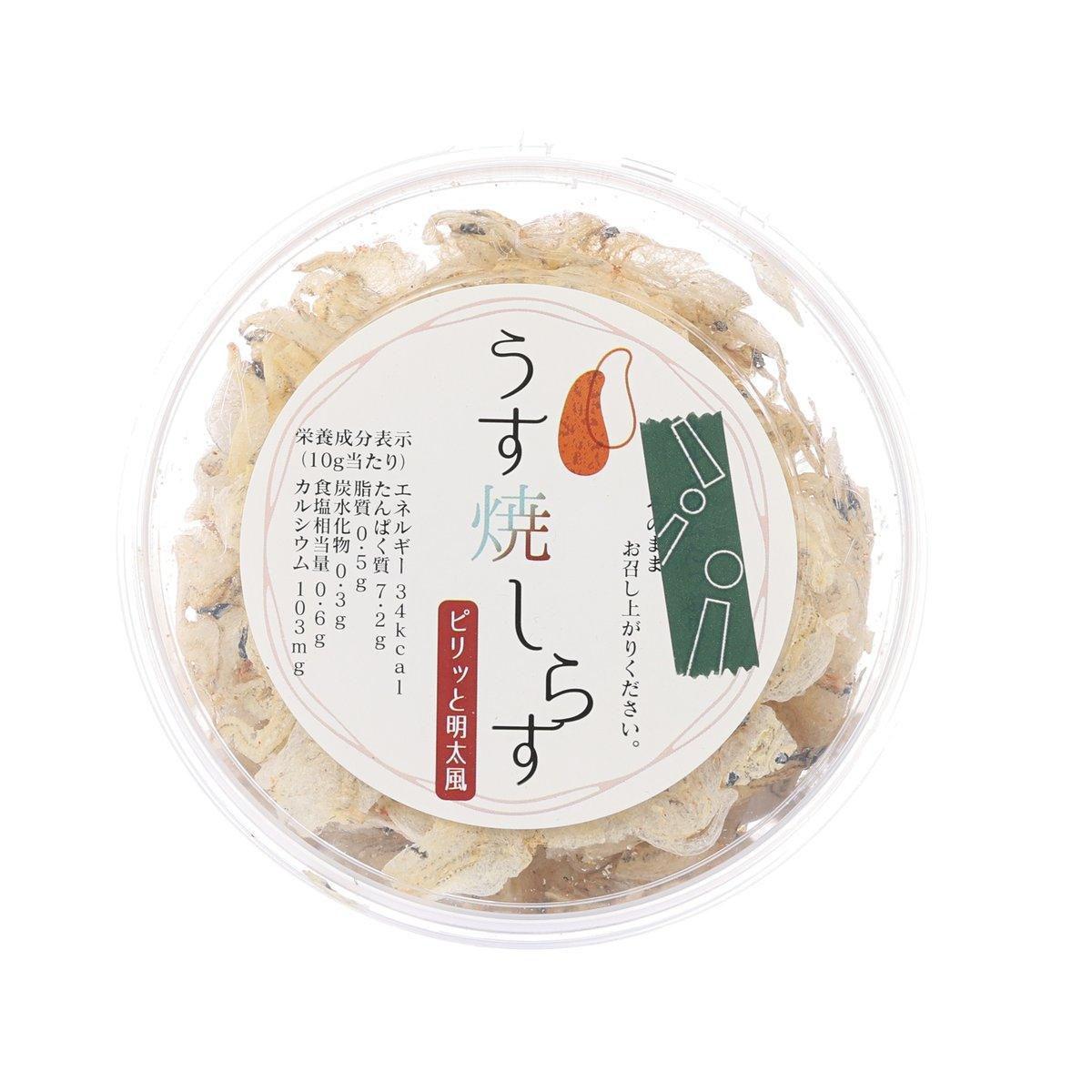 Spicy cod roe Shirasu chips in clear round plastic tub with Japanese label
