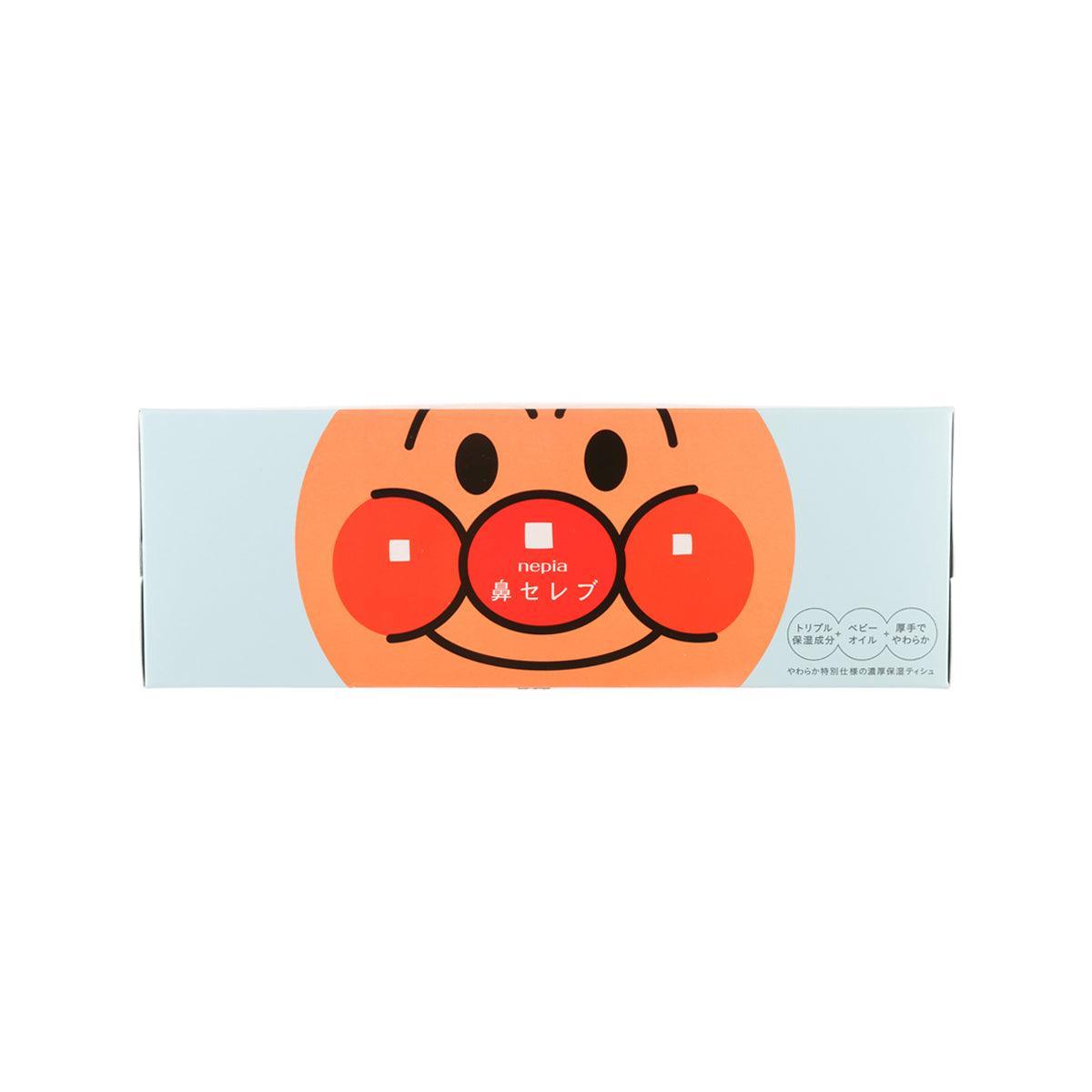 Kids tissue box with orange character face graphic on light blue