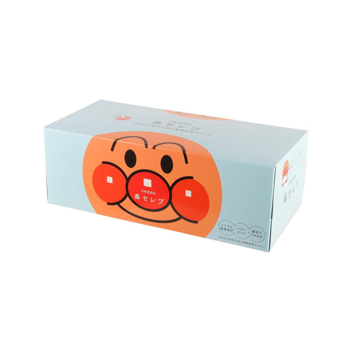 Kids tissue box with orange character face graphic on light blue, side view
