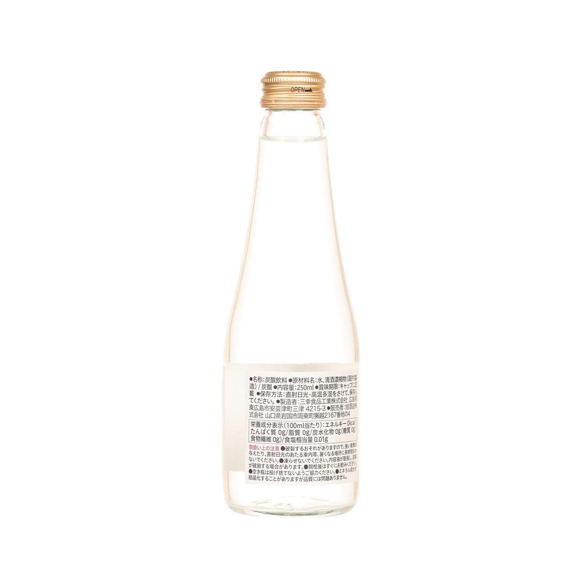 DASSAI carbonated beverage bottle, clear glass with golden cap and back label text