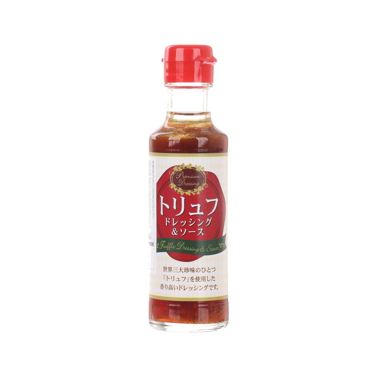Truffle dressing sauce bottle, red cap, clear glass with amber liquid, front label