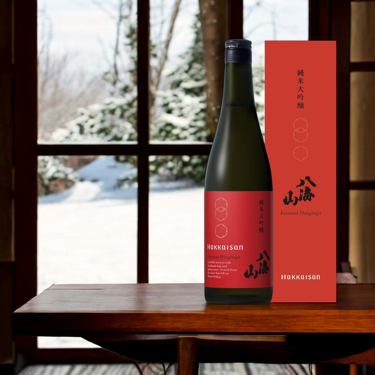 Sake bottle and red box set by HAKKAISAN on wooden table, seasonal Junmai Daiginjo 720 mL
