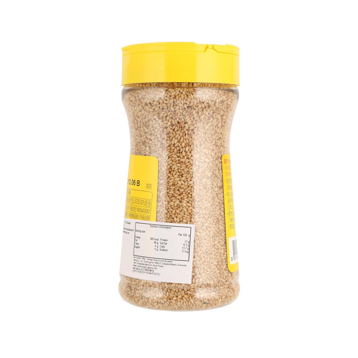 OTTOGI jar of roasted sesame seeds, back label visible, clear view of sesame kernels