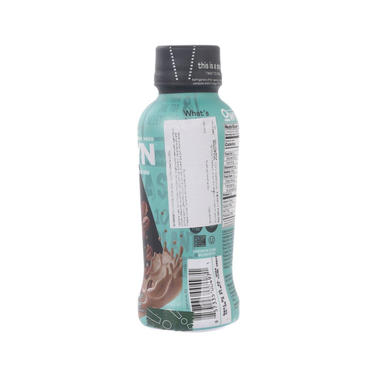 OWYN plant based protein drink bottle, back label with nutrition facts; turquoise bottle, black cap.