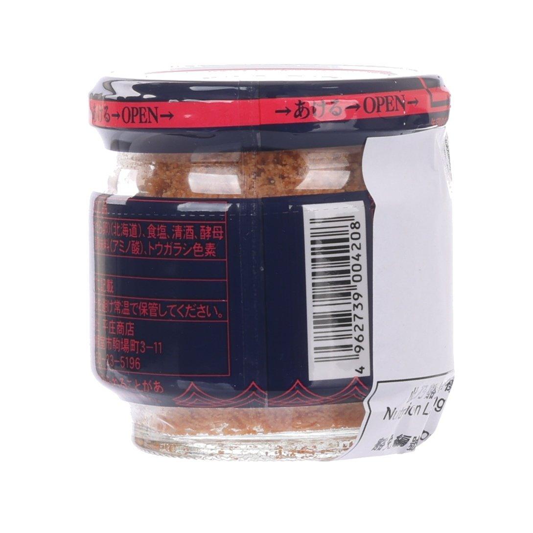 Grilled cod roe jar with white barcode sticker, red lid and clear base.