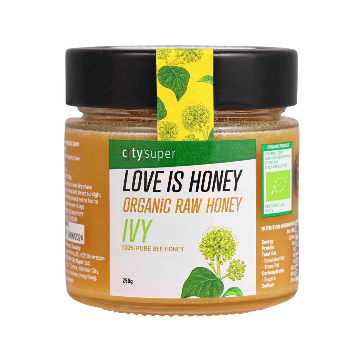 Organic raw ivy honey jar with black lid, amber honey, green leaf label