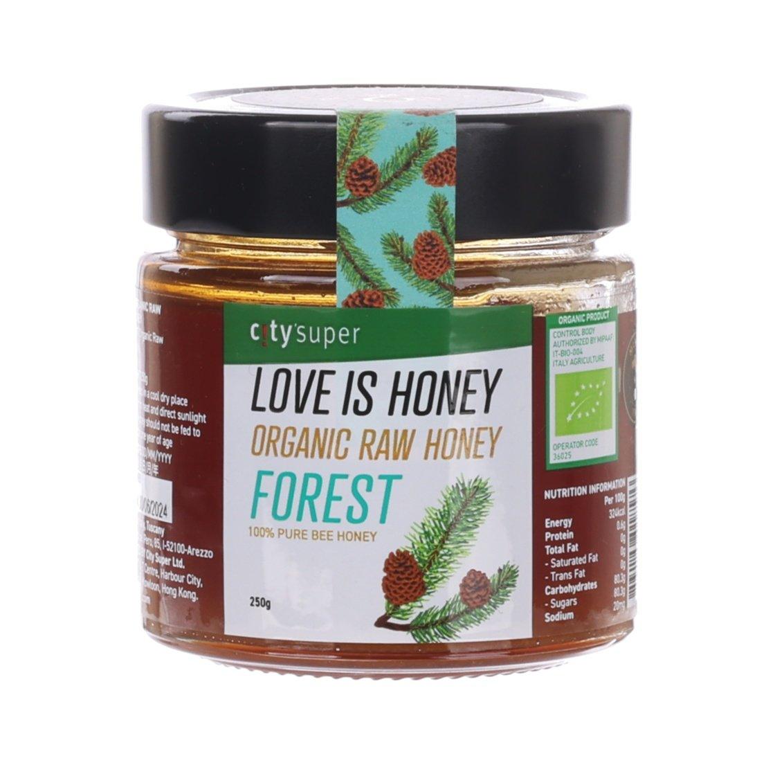 Organic raw forest honey jar with dark cap and floral label, 250g glass bottle