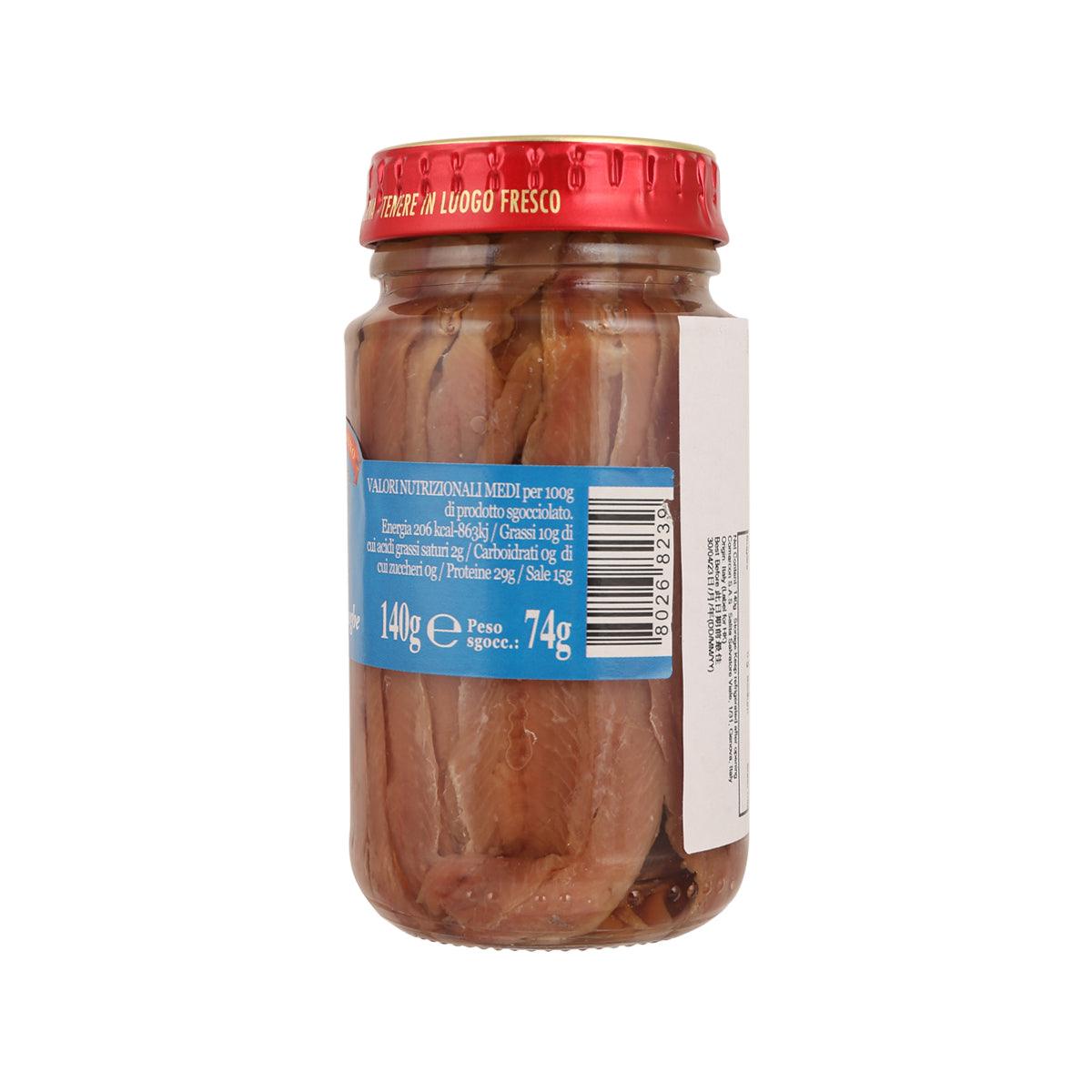 Anchovy fillets in olive oil jar, blue nutrition label on back