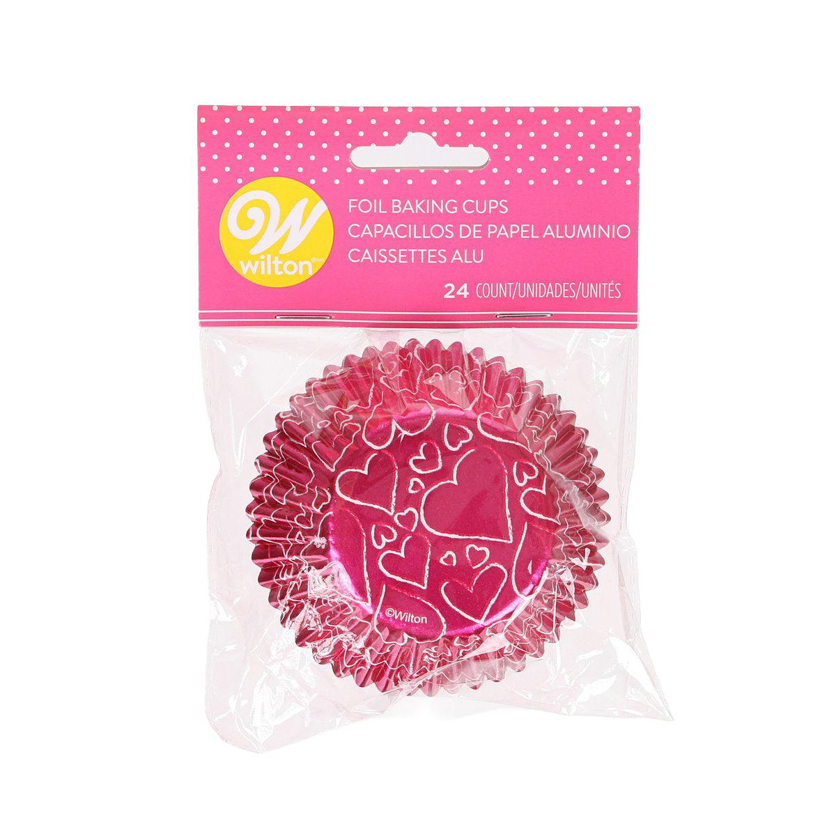 Pink foil baking cups with heart pattern, packaged in a Valentine's polka-dot pouch