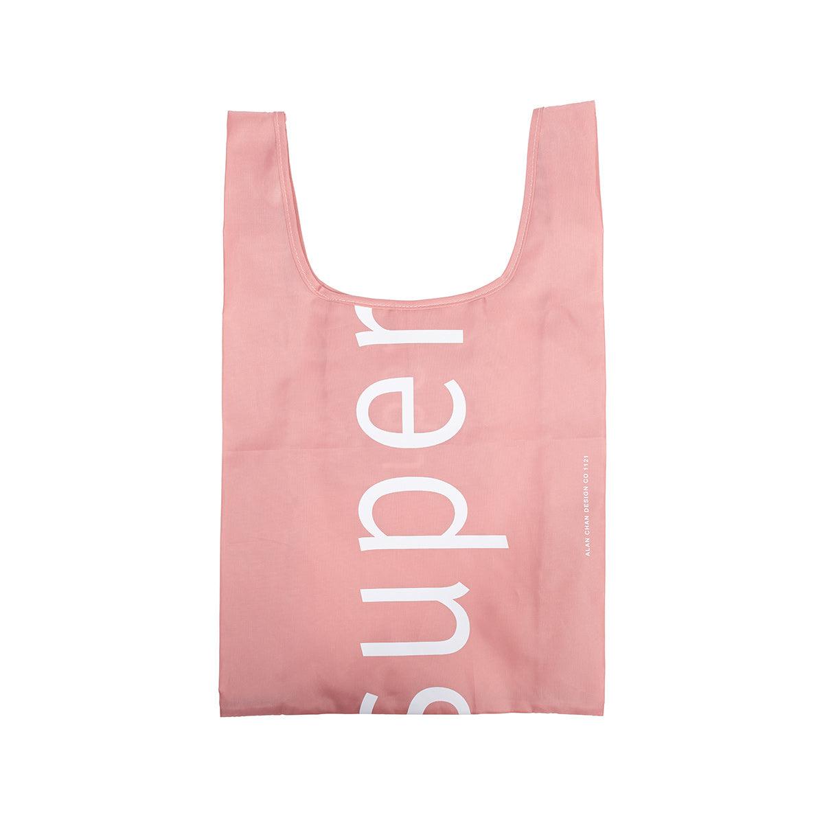 Coral small foldable tote bag with large vertical logo print