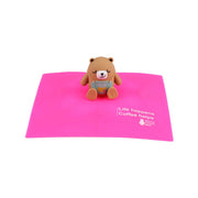 Pink square silicone cup cover with cute bear figurine topper